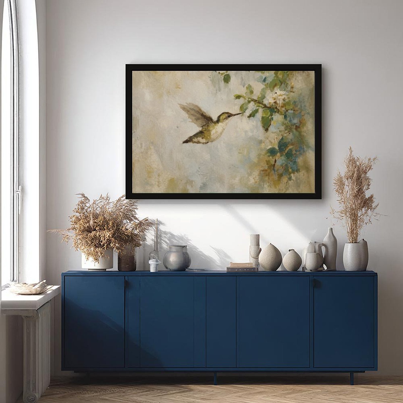 hummingbird hovering beside pale blossoms in cream, sage green, soft blue tones — Black Frame SCENE_01