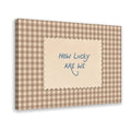 blue handwritten gratitude quote on brown gingham in taupe, cream, blue tones — Wrapped Canvas HERO