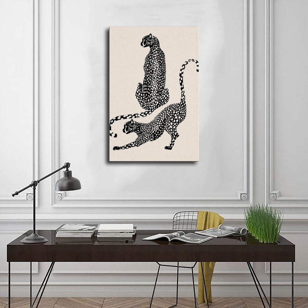 two spotted big cats in contrasting poses in black, warm cream tones — Wrapped Canvas SCENE_01