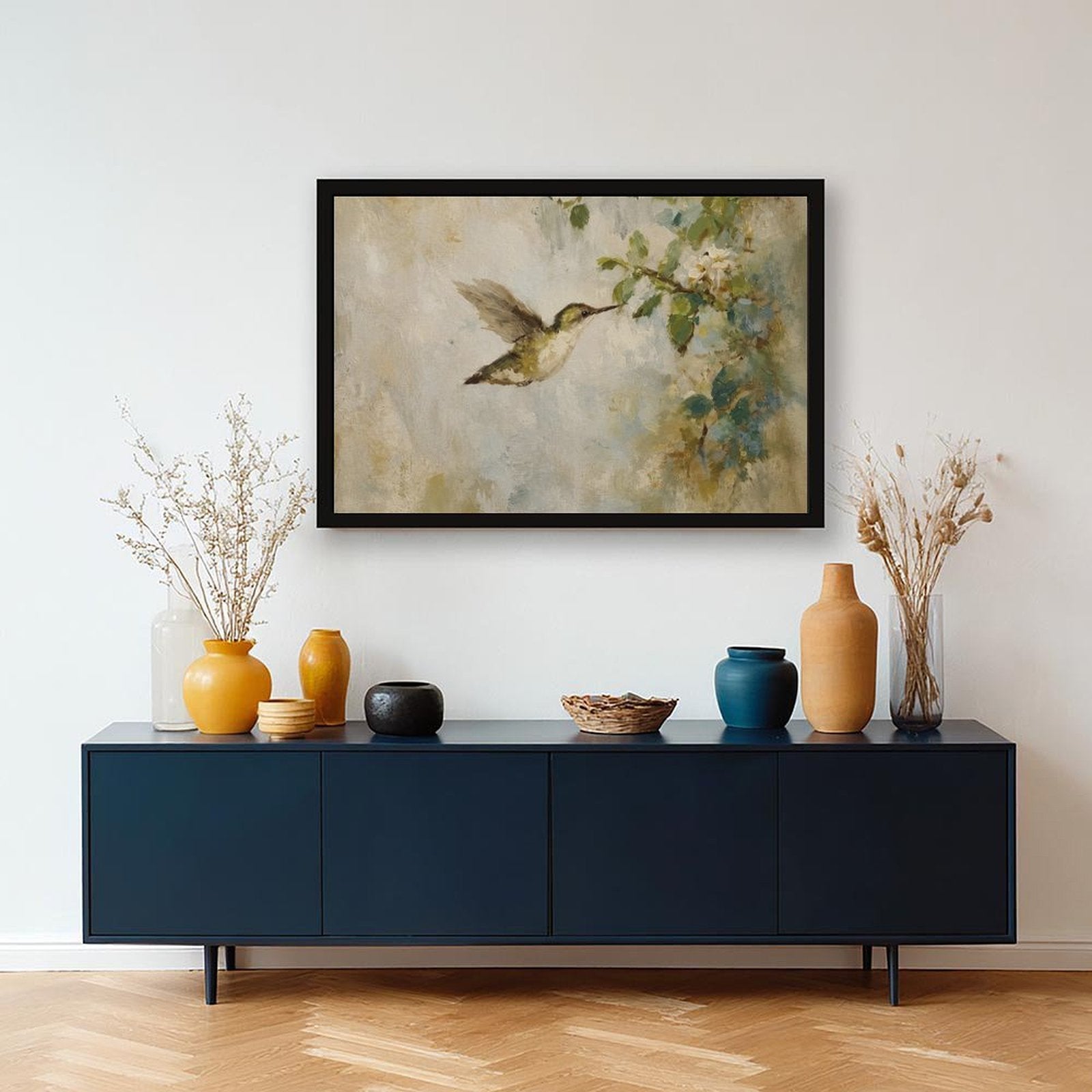 hummingbird hovering beside pale blossoms in cream, sage green, soft blue tones — Black Frame SCENE_02