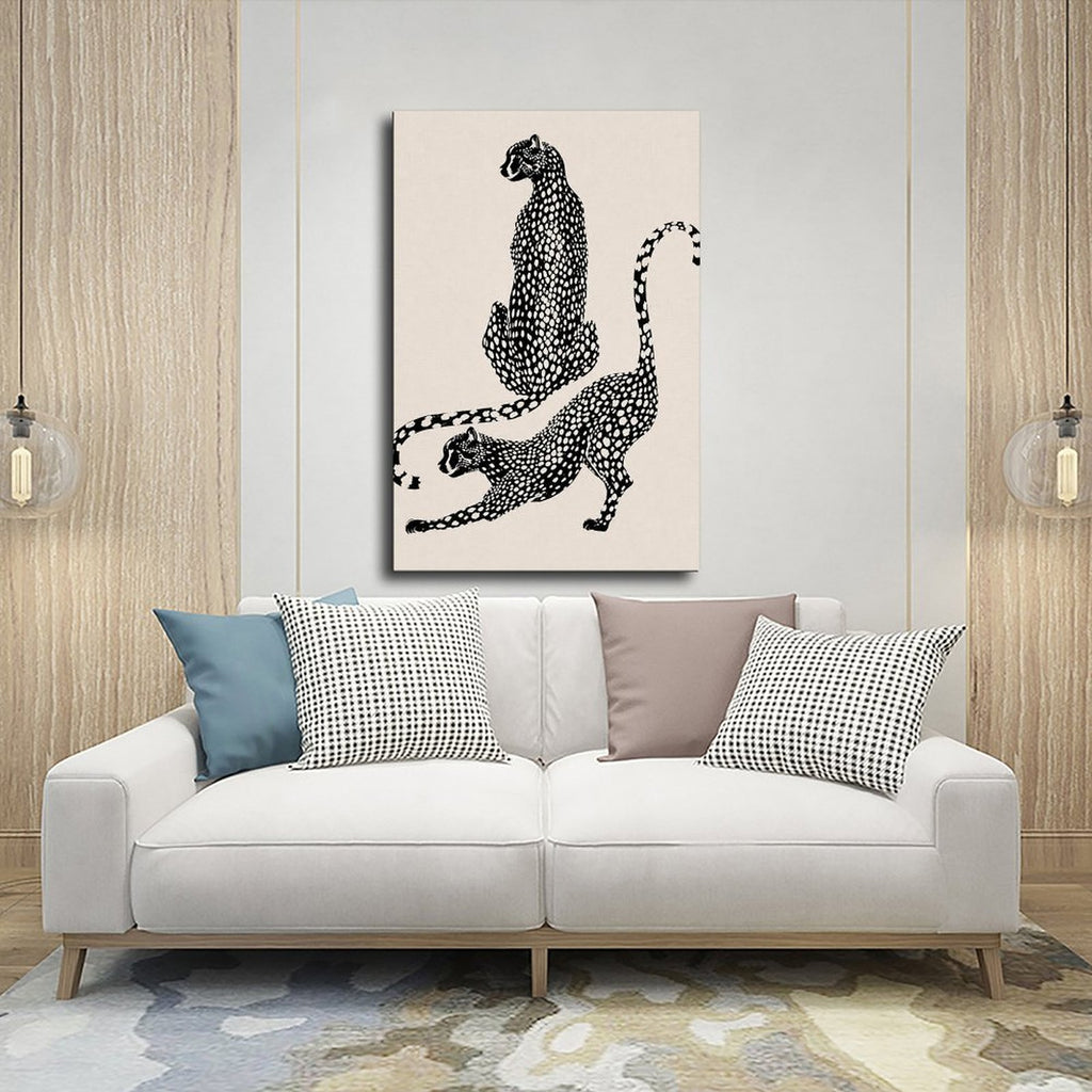two spotted big cats in contrasting poses in black, warm cream tones — Wrapped Canvas SCENE_03