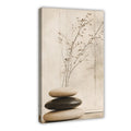 stacked smooth stones with a sparse dried branch in cream, taupe, charcoal tones — Wrapped Canvas HERO
