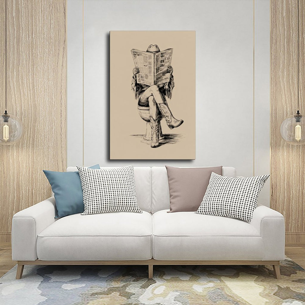 cowboy seated on a toilet reading a newspaper in black, warm cream tones — Wrapped Canvas SCENE_03