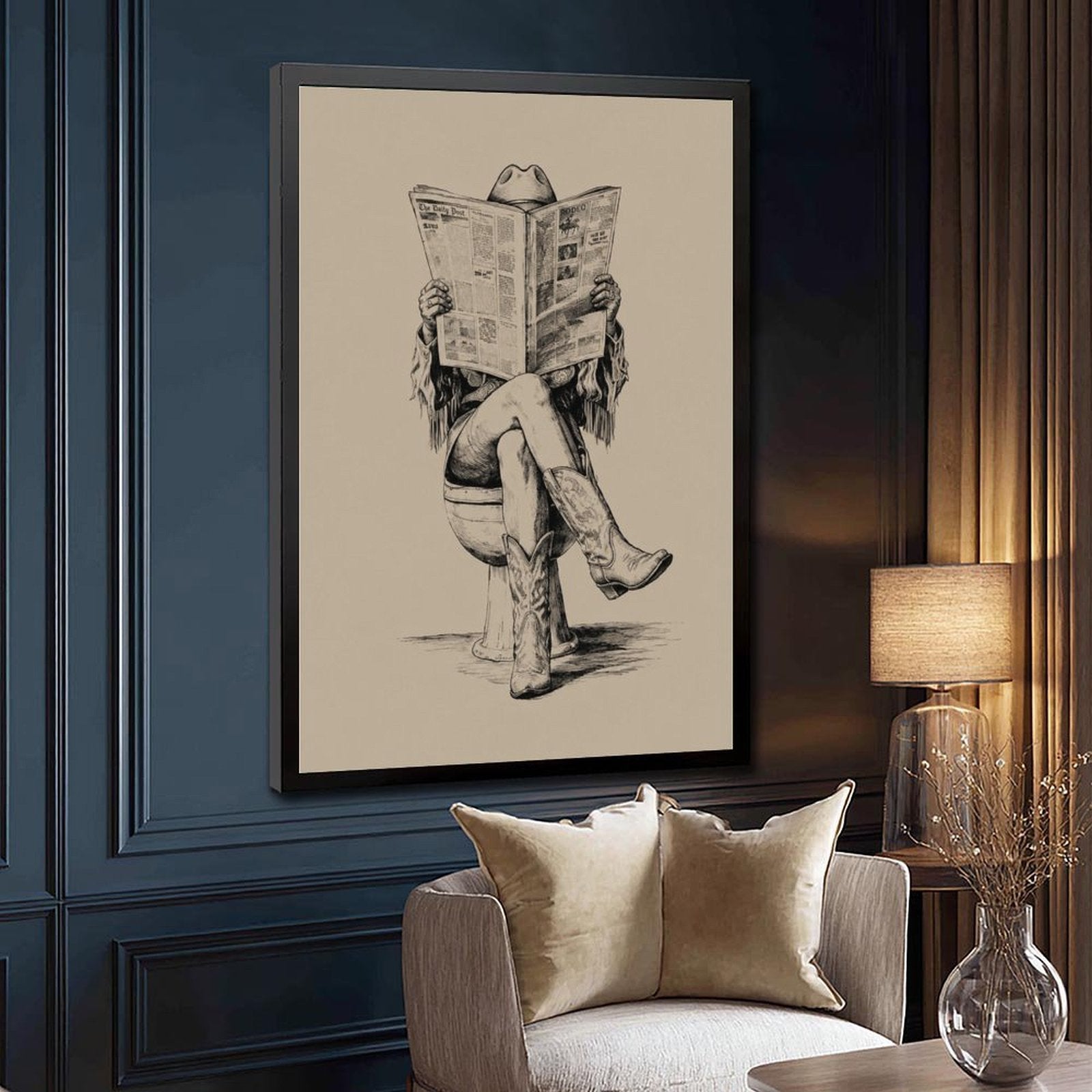 cowboy seated on a toilet reading a newspaper in black, warm cream tones — Black Frame SIDE_DETAIL
