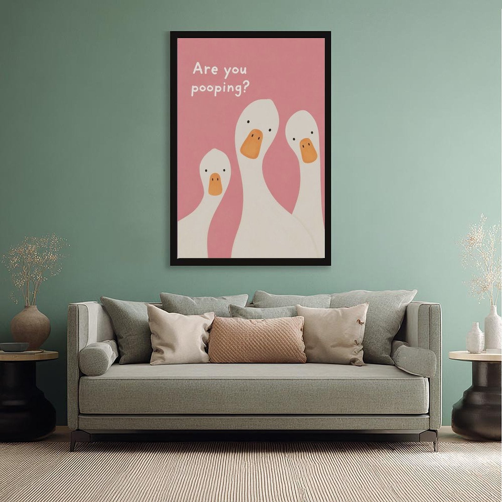 three white ducks beneath bathroom humor typography in pink, white, orange tones — Black Frame SCENE_02