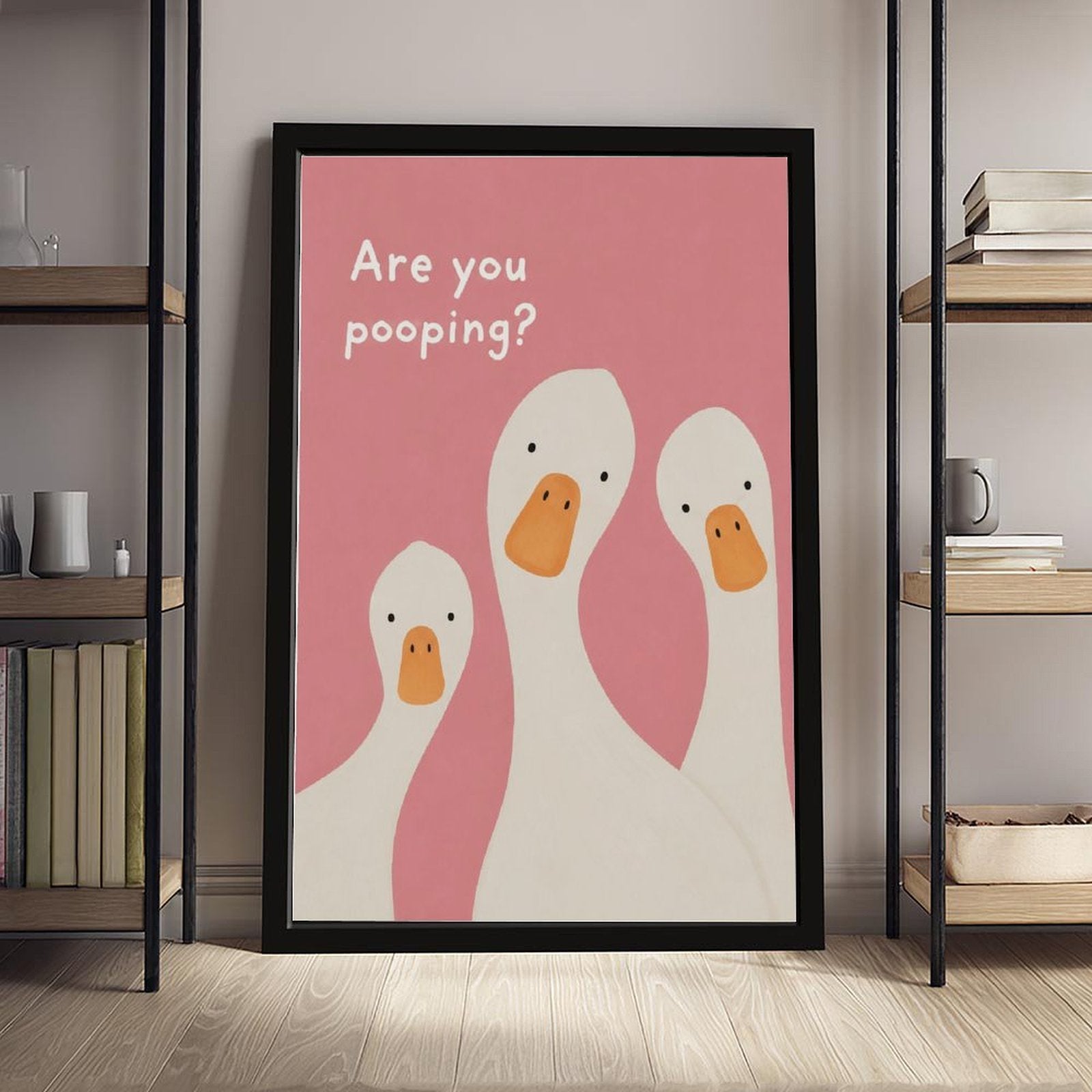 three white ducks beneath bathroom humor typography in pink, white, orange tones — Black Frame SCENE_01