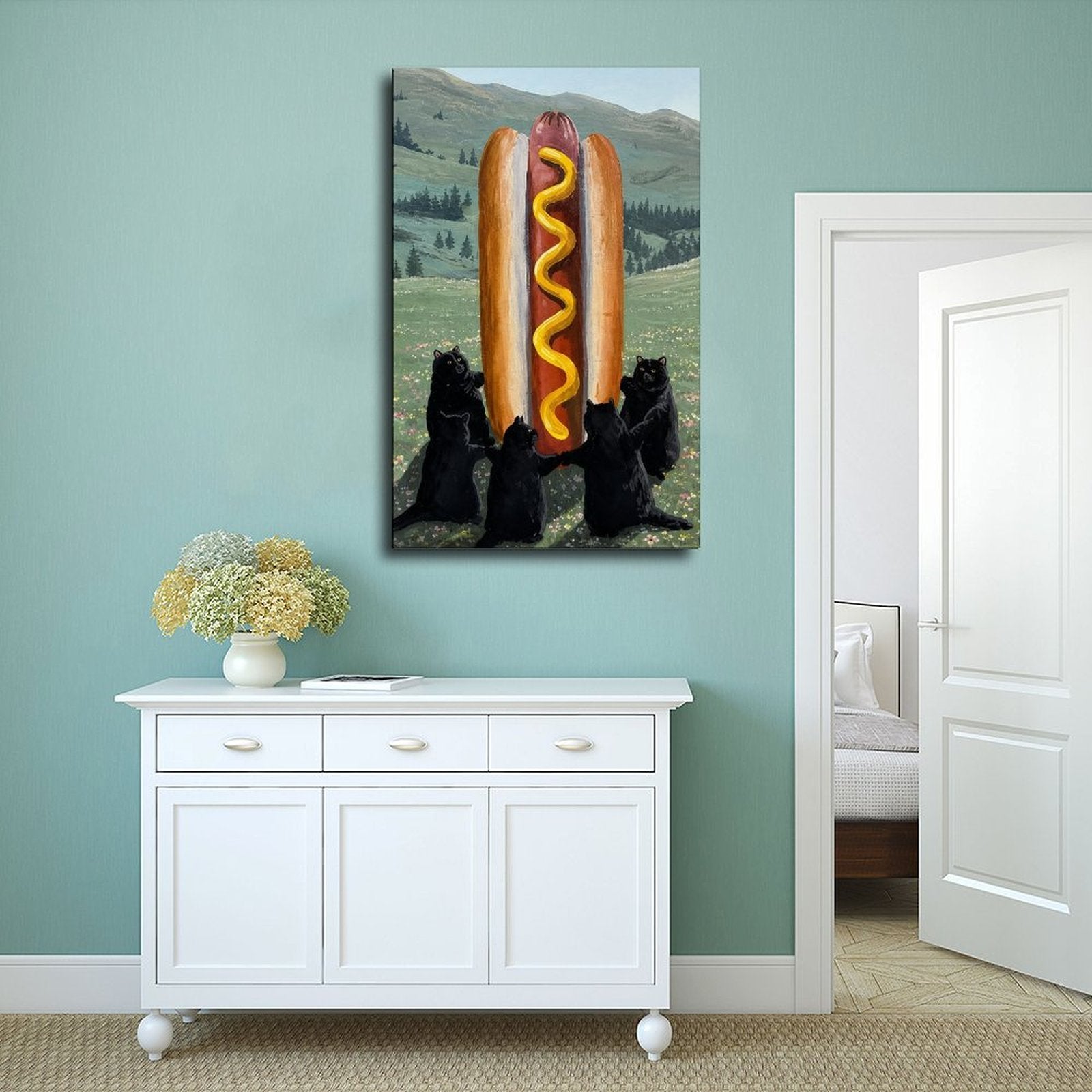 three black bears presenting a giant hot dog in a mountain meadow in green, black, red tones — Wrapped Canvas SCENE_02