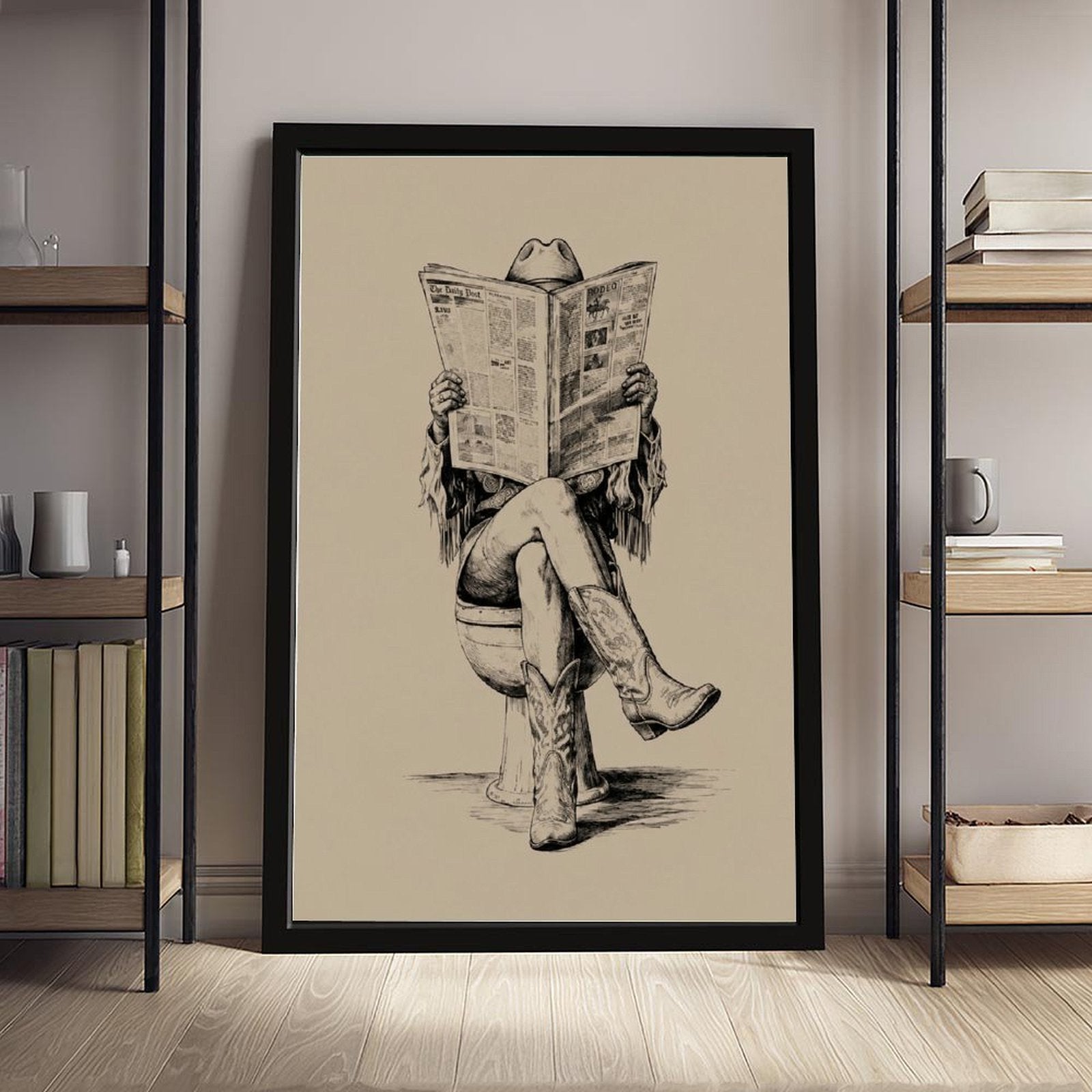 cowboy seated on a toilet reading a newspaper in black, warm cream tones — Black Frame SCENE_01