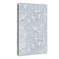 flock of white birds in flight in minimalist animal art style — Wrapped Canvas HERO