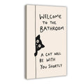 black cat peeking beside bathroom typography in black, cream tones — Wrapped Canvas HERO